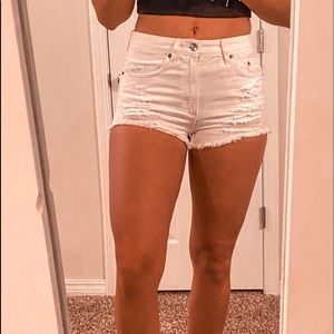 White ripped HM shorts